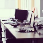 empty office with modern computers to illustrate how to pack a monitor for moving